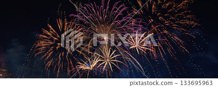 Colorful fireworks explode over the city skyline at night, celebrating the arrival of 2026 with joy, light, and new energy. Colorful fireworks explode over the city skyline at night, celebrating the arrival of 2026 with joy, light, and new energy. 133695963