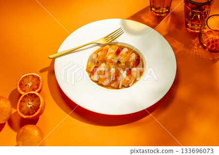 Fine dining seafood ceviche with blood orange dressing Fine dining seafood ceviche with blood orange dressing 133696073