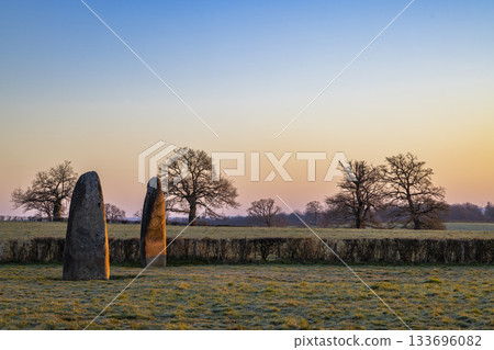 Menhirs de Pierre Fritte standing in frosty field at sunrise in Saone et Loire, France Menhirs de Pierre Fritte standing in frosty field at sunrise in Saone et Loire, France 133696082