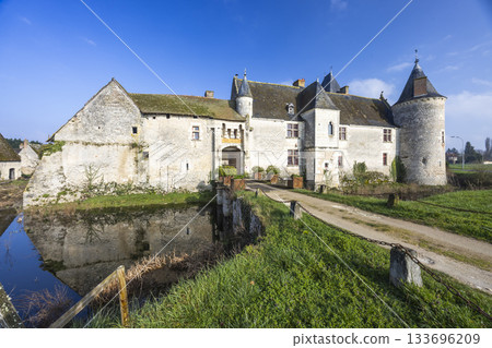Chateau de Chemery reflecting its medieval architecture in the moat Chateau de Chemery reflecting its medieval architecture in the moat 133696209