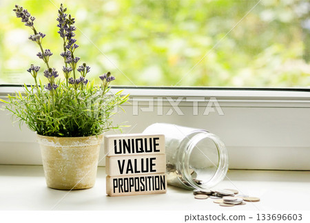 Wooden cubes create the word UVP, an abbreviation of a unique value proposition Wooden cubes create the word UVP, an abbreviation of a unique value proposition 133696603