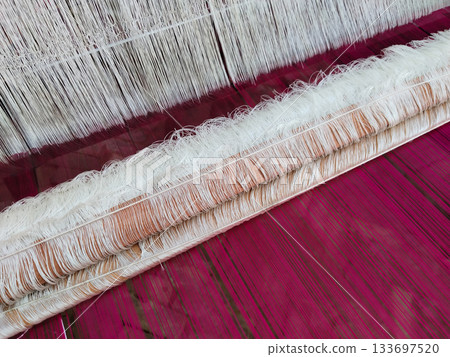 a Weaving from silk threads by loom a Weaving from silk threads by loom 133697520