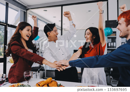 Diversity, dinner and group of people toast celebration together at party. Friends, happy and celebrate with food, wine and friendship for love, support and cheers champagne at business function Diversity, dinner and group of people toast celebration together at party. Friends, happy and celebrate with food, wine and friendship for love, support and cheers champagne at business function 133697695