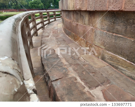 ancient historical buildings fenced by stylish wooden design 133697771