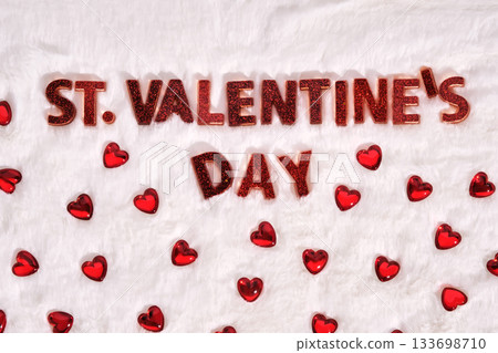 Festive St. Valentine's Day background on a white plush background with hearts. 133698710