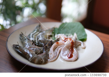 raw shrimp and octopus Seafood cocktail with octopus, shrimp, calamari and mussel 133698730