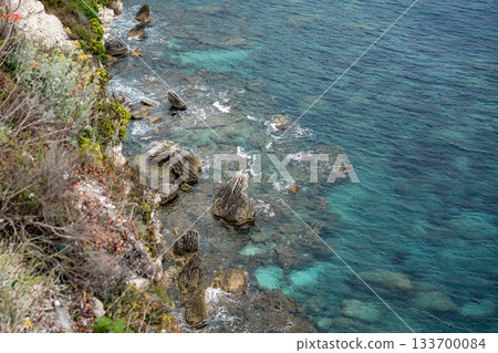 Aerial view marina cape Bonifacio south Corsica France citadel on rocky promontory on wild white limestone cliffs Aerial view marina cape Bonifacio south Corsica France citadel on rocky promontory on wild white limestone cliffs 133700084