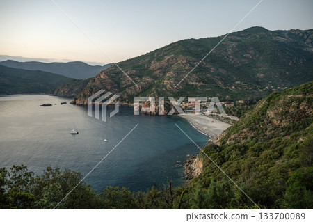 Aerial view town ruins Genoese tower of Porto Corsica France medieval watchtower Mediterranean Sea Calanches de Piana Aerial view town ruins Genoese tower of Porto Corsica France medieval watchtower Mediterranean Sea Calanches de Piana 133700089