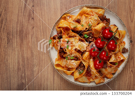 pappardelle pasta with bolognese sauce, topped with parmesan cheese and cherry branch, homemade, no people, pappardelle pasta with bolognese sauce, topped with parmesan cheese and cherry branch, homemade, no people, 133700204