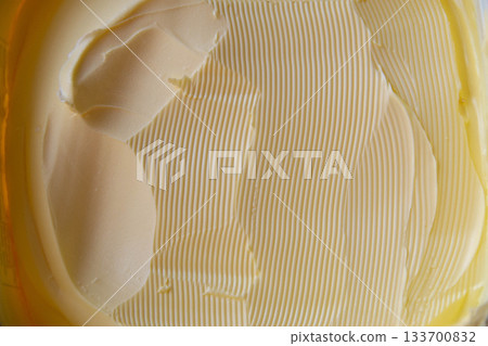 Yellow butter background and texture. Butter texture background. High quality photo 133700832