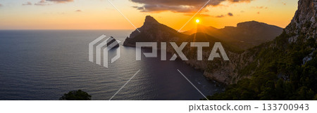 Golden sunset over the cliffs of Cap de Formentor, Mallorca, Spain. Breathtaking Mediterranean landscape with sun rays over the rocky coast, captured in stunning high resolution. Golden sunset over the cliffs of Cap de Formentor, Mallorca, Spain. Breathtaking Mediterranean landscape with sun rays over the rocky coast, captured in stunning high resolution. 133700943