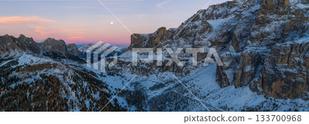Panoramic view of Dolomite mountain peaks in beautiful morning light. Early winter scene with snow-covered summits, captured in high resolution. perfect for large fine art prints. 133700968