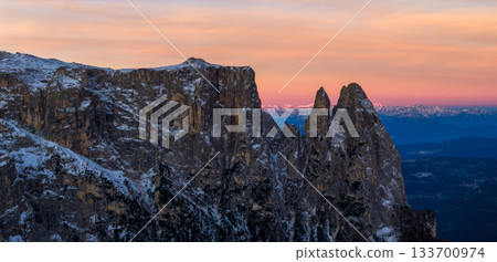 Panoramic view of Dolomite mountain peaks in beautiful morning light. Early winter scene with snow-covered summits, captured in high resolution. perfect for large fine art prints. 133700974