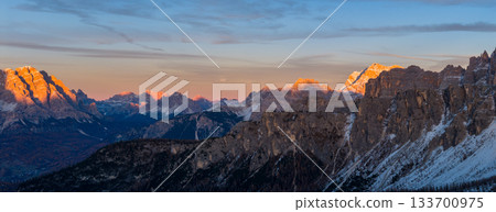 Panoramic view of Dolomite mountain peaks in beautiful morning light. Early winter scene with snow-covered summits, captured in high resolution. perfect for large fine art prints. 133700975