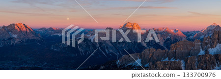 Panoramic view of Dolomite mountain peaks in beautiful morning light. Early winter scene with snow-covered summits, captured in high resolution. perfect for large fine art prints. 133700976