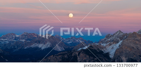 Panoramic view of Dolomite mountain peaks in beautiful morning light. Early winter scene with snow-covered summits, captured in high resolution. perfect for large fine art prints. 133700977