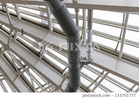 The photograph displays an industrial ventilation system 133701777
