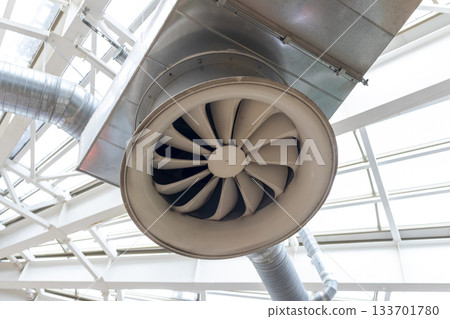 The photograph displays an industrial ventilation system 133701780