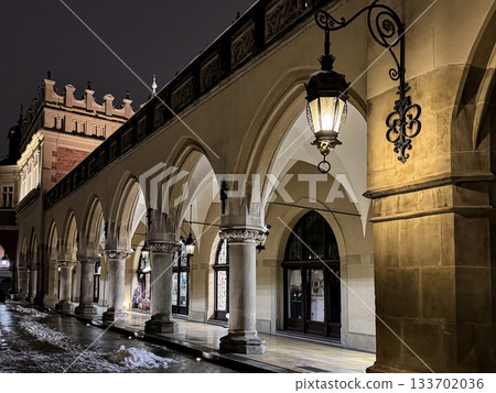 Night scene of Historic Sukiennice Cloth Hall Arcades in Old Town Krakow, Poland 133702036