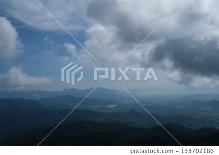 Scenic view dramatic beautiful sunset sky. Natural Sunset Sunrise on meadow silhouette shadow dark land. Vibrant dramatic sky on sunset, dawn, sunrise in Countryside. Landscape Colorful Sky  133702186