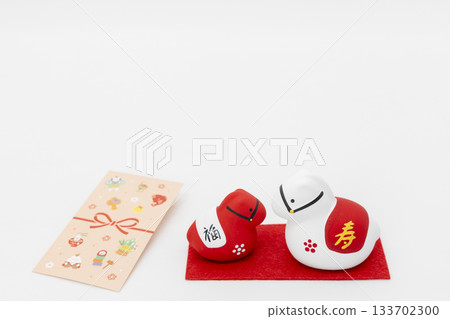 Horse decorations and New Year's gift bags on a white background Horse decorations and New Year's gift bags on a white background 133702300