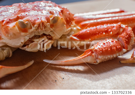 Giant snow crab and cutting board 133702336