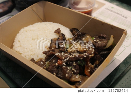 Korean Food Rice with Meat and Water Rolls in a Disposable Container. 133702414