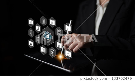 Businessperson interacting with digital cloud security interface on tablet, showcasing technology, protection, and modern cybersecurity solutions. Gantry Businessperson interacting with digital cloud security interface on tablet, showcasing technology, protection, and modern cybersecurity solutions. Gantry 133702479