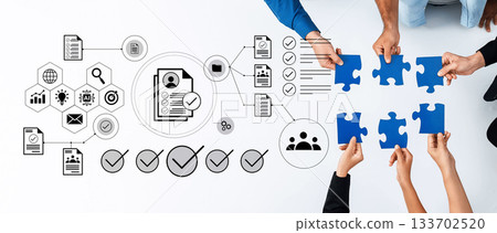 Collaborative Problem Solving and Teamwork Illustrated with Hands Holding Blue Puzzle Pieces and Workflow Elements in a Modern Business Environment Gantry Collaborative Problem Solving and Teamwork Illustrated with Hands Holding Blue Puzzle Pieces and Workflow Elements in a Modern Business Environment Gantry 133702520