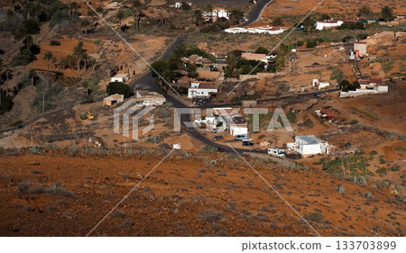 Top view through the clouds on Fuerteventura islands landscapes. 133703899