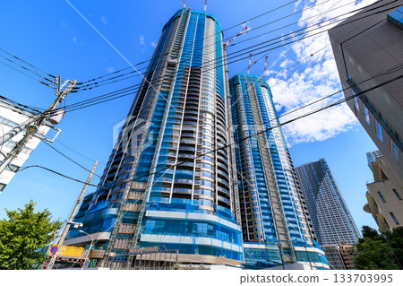 Tower apartment building under construction in Toyosu-cho, Chuo-ku, Tokyo Tower apartment building under construction in Toyosu-cho, Chuo-ku, Tokyo 133703995