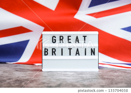 Minimal patriotic scene with signboard and waving flag message AUSTRALIA with national colors Festive with Aussie flag and message board with text AUSTRALIA 133704038