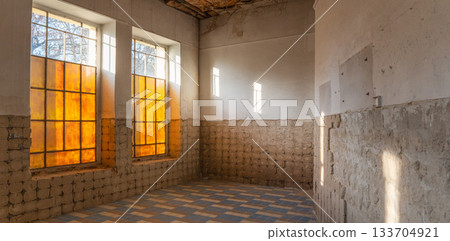 Abandoned Room with Old Yellow Windows and Sunlight Abandoned Room with Old Yellow Windows and Sunlight 133704921