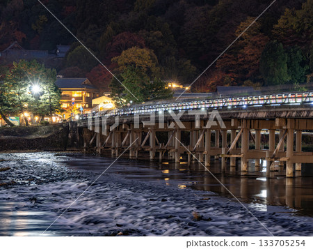 Illuminated night view of Arashiyama from Togetsukyo Bridge 133705254