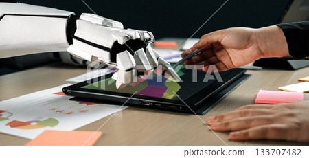 Robot and Human Collaboration in Digital Art Creation with Touchscreen Tablet and Colorful Graphics in Modern Office Setting. Noogenesis 133707482