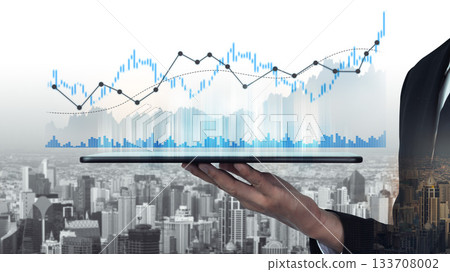 Businessman Holding Tablet with Financial Graphs and Charts Over City Skyline Background for Stock Photo Use in Finance and Technology Themes Scalp Businessman Holding Tablet with Financial Graphs and Charts Over City Skyline Background for Stock Photo Use in Finance and Technology Themes Scalp 133708002