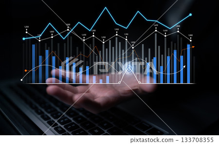 Hand with Digital Financial Graphs and Data Visualization on Laptop in Dark Environment for Business and Technology Concepts Scalp Hand with Digital Financial Graphs and Data Visualization on Laptop in Dark Environment for Business and Technology Concepts Scalp 133708355