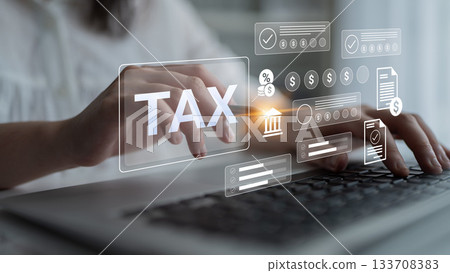 Hands Typing Tax Information on Laptop with Digital Tax Icons and Resources Illustrating Financial Management and Tax Filing Concept Gantry Hands Typing Tax Information on Laptop with Digital Tax Icons and Resources Illustrating Financial Management and Tax Filing Concept Gantry 133708383