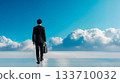 Future vision: Businessman walking on clouds and endless sky 133710032