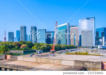 Tokyo cityscape in Japan: View of the Shiodome buildings, Roppongi, Azabudai, Tokyo Tower, the former Tsukiji Market, and demolition work Tokyo cityscape in Japan: View of the Shiodome buildings, Roppongi, Azabudai, Tokyo Tower, the former Tsukiji Market, and demolition work 133710081