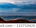 A distant view of the Kofu Basin in autumn 133710426