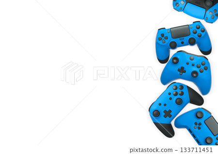 Wireless gaming controllers flying in air isolated on white background, symbolizing gaming technology concept 133711451