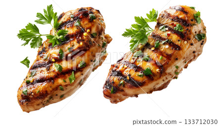 Grilled chicken breast garnished with herbs isolated on white background. Concept of healthy food and cooking simplicity 133712030