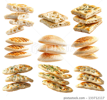 Various types of flatbreads and pita breads arranged on white background, showing texture and variety, concept of traditional food Various types of flatbreads and pita breads arranged on white background, showing texture and variety, concept of traditional food 133712117