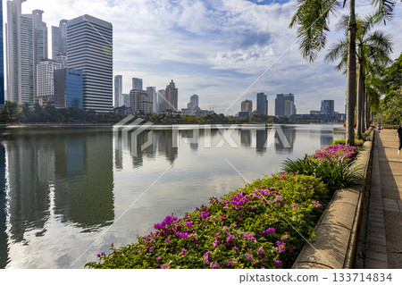 Benjakitti Park and skyscrapers in Bangkok, Thailand 133714834