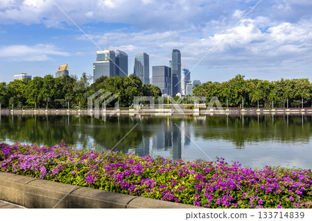 Benjakitti Park and skyscrapers in Bangkok, Thailand 133714839