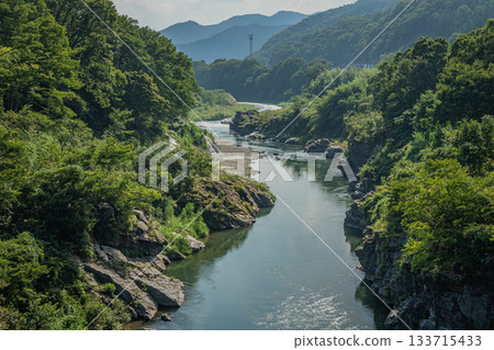 Summer scenery of Nagatoro Town and the Arakawa Valley, with clear streams and deep greenery Summer scenery of Nagatoro Town and the Arakawa Valley, with clear streams and deep greenery 133715433
