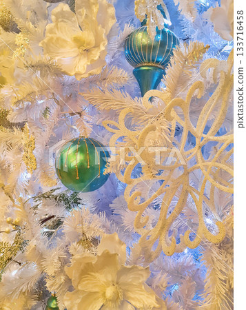 Silver branch of Christmas tree with decoration balls 133716458