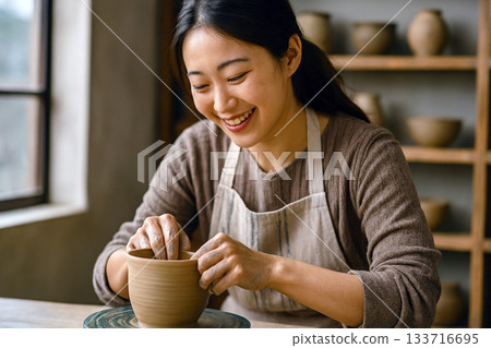 A woman doing ceramics A woman doing ceramics 133716695