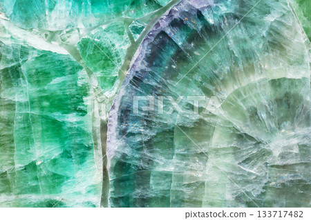 Green Fluorite precious stone, natural texture as part of unique interior. Green Fluorite precious stone, natural texture as part of unique interior. 133717482
